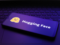 The Hugging Face logo appears on the screen of a smartphone in Reno, United States, on December 2, 2024. (