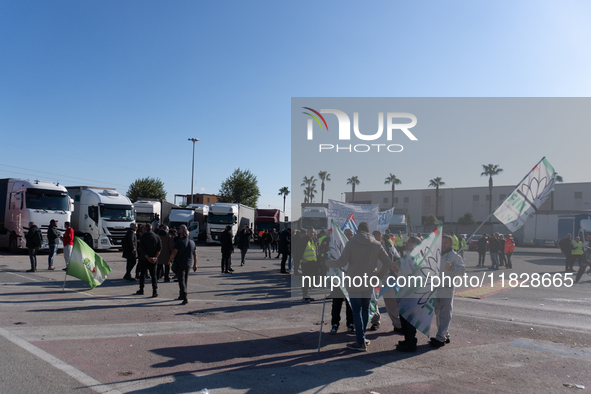 Trasnova workers protest on Monday in front of the gates of the Stellantis plant in Pomigliano D'Arco, Italy, on december 02, 2024. Workers...