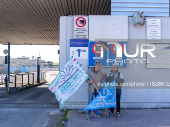 Trasnova workers protest on Monday in front of the gates of the Stellantis plant in Pomigliano D'Arco, Italy, on december 02, 2024. Workers...