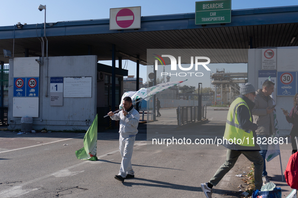 Trasnova workers protest on Monday in front of the gates of the Stellantis plant in Pomigliano D'Arco, Italy, on december 02, 2024. Workers...