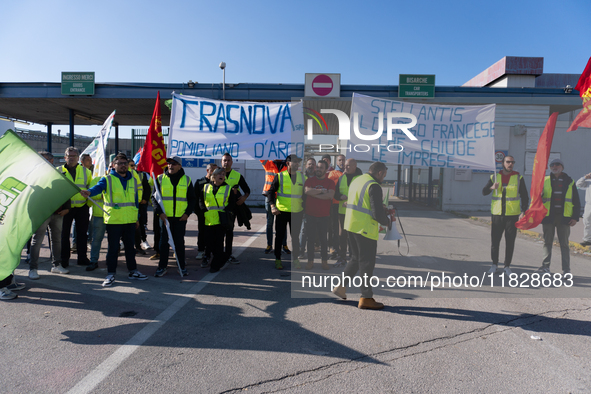 Trasnova workers protest on Monday in front of the gates of the Stellantis plant in Pomigliano D'Arco, Italy, on december 02, 2024. Workers...