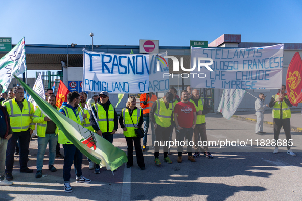 Trasnova workers protest on Monday in front of the gates of the Stellantis plant in Pomigliano D'Arco, Italy, on december 02, 2024. Workers...