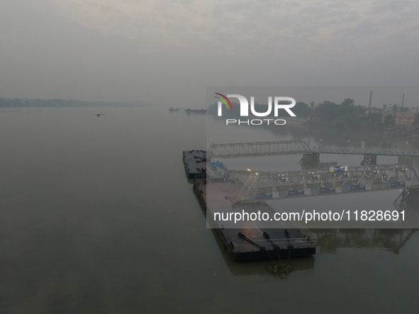 The Ganga River is on a foggy morning amid rising air pollution levels in Kolkata, India, on December 02, 2024. 