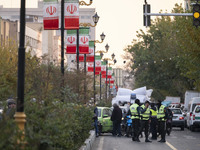 Iranian policemen block a street to the Turkish embassy during a protest against Turkish President Recep Tayyip Erdogan and his diplomacy re...