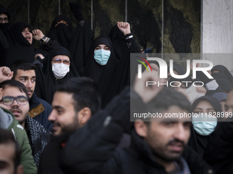 Iranian protesters shout anti-Turkish President slogans while participating in a protest against Turkish President Recep Tayyip Erdogan and...