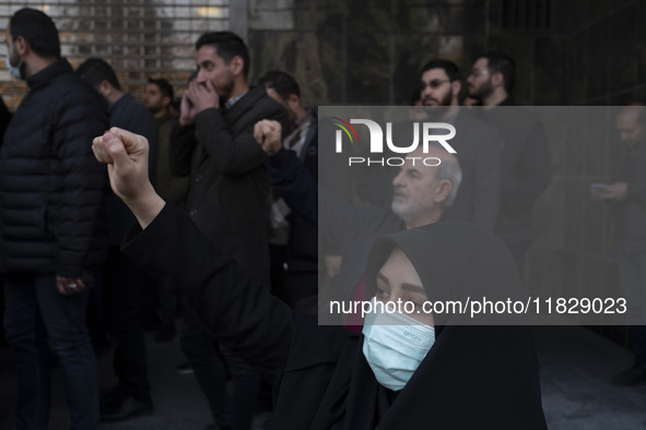 A veiled Iranian protester shouts anti-Turkish President slogans while participating in a protest against Turkish President Recep Tayyip Erd...