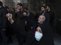 A veiled Iranian protester shouts anti-Turkish President slogans while participating in a protest against Turkish President Recep Tayyip Erd...