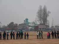 Sikh boys and girls practice hockey in Baramulla, Jammu and Kashmir, India, on December 1, 2024. (