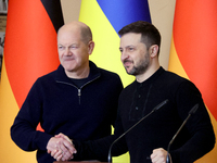 In Kyiv, Ukraine, on December 2, 2024, President of Ukraine Volodymyr Zelenskyy shakes hands with Federal Chancellor of Germany Olaf Scholz...