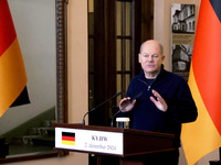 Federal Chancellor of Germany Olaf Scholz attends a joint briefing with President of Ukraine Volodymyr Zelenskyy in Kyiv, Ukraine, on Decemb...