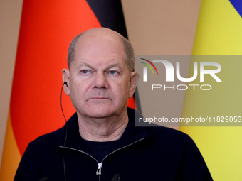 Federal Chancellor of Germany Olaf Scholz attends a joint briefing with President of Ukraine Volodymyr Zelenskyy in Kyiv, Ukraine, on Decemb...