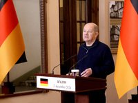 Federal Chancellor of Germany Olaf Scholz attends a joint briefing with President of Ukraine Volodymyr Zelenskyy in Kyiv, Ukraine, on Decemb...