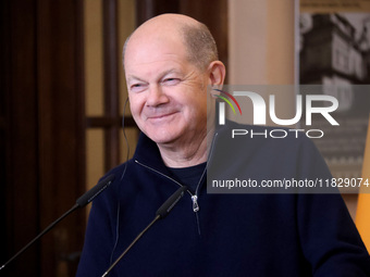 Federal Chancellor of Germany Olaf Scholz attends a joint briefing with President of Ukraine Volodymyr Zelenskyy in Kyiv, Ukraine, on Decemb...