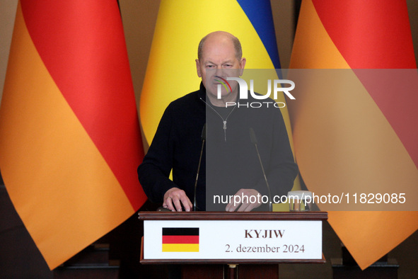 Federal Chancellor of Germany Olaf Scholz attends a joint briefing with President of Ukraine Volodymyr Zelenskyy in Kyiv, Ukraine, on Decemb...