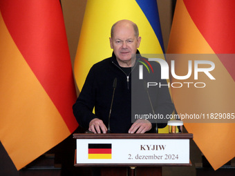 Federal Chancellor of Germany Olaf Scholz attends a joint briefing with President of Ukraine Volodymyr Zelenskyy in Kyiv, Ukraine, on Decemb...