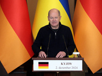 Federal Chancellor of Germany Olaf Scholz attends a joint briefing with President of Ukraine Volodymyr Zelenskyy in Kyiv, Ukraine, on Decemb...