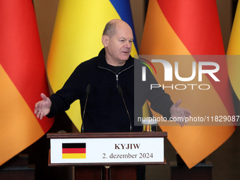 Federal Chancellor of Germany Olaf Scholz attends a joint briefing with President of Ukraine Volodymyr Zelenskyy in Kyiv, Ukraine, on Decemb...