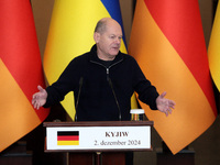 Federal Chancellor of Germany Olaf Scholz attends a joint briefing with President of Ukraine Volodymyr Zelenskyy in Kyiv, Ukraine, on Decemb...