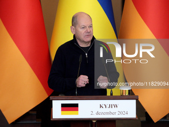 Federal Chancellor of Germany Olaf Scholz attends a joint briefing with President of Ukraine Volodymyr Zelenskyy in Kyiv, Ukraine, on Decemb...