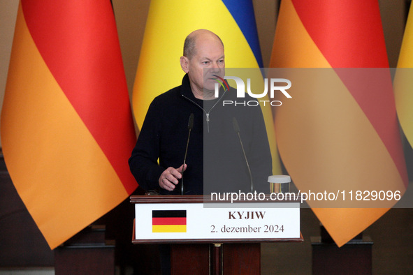 Federal Chancellor of Germany Olaf Scholz attends a joint briefing with President of Ukraine Volodymyr Zelenskyy in Kyiv, Ukraine, on Decemb...