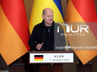 Federal Chancellor of Germany Olaf Scholz attends a joint briefing with President of Ukraine Volodymyr Zelenskyy in Kyiv, Ukraine, on Decemb...