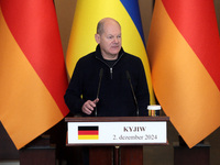 Federal Chancellor of Germany Olaf Scholz attends a joint briefing with President of Ukraine Volodymyr Zelenskyy in Kyiv, Ukraine, on Decemb...