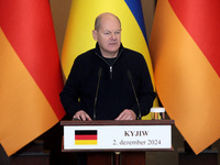 Federal Chancellor of Germany Olaf Scholz attends a joint briefing with President of Ukraine Volodymyr Zelenskyy in Kyiv, Ukraine, on Decemb...