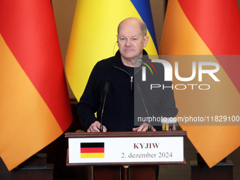 Federal Chancellor of Germany Olaf Scholz attends a joint briefing with President of Ukraine Volodymyr Zelenskyy in Kyiv, Ukraine, on Decemb...