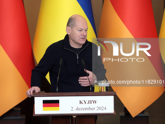 Federal Chancellor of Germany Olaf Scholz attends a joint briefing with President of Ukraine Volodymyr Zelenskyy in Kyiv, Ukraine, on Decemb...