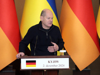 Federal Chancellor of Germany Olaf Scholz attends a joint briefing with President of Ukraine Volodymyr Zelenskyy in Kyiv, Ukraine, on Decemb...