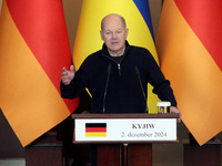 Federal Chancellor of Germany Olaf Scholz attends a joint briefing with President of Ukraine Volodymyr Zelenskyy in Kyiv, Ukraine, on Decemb...