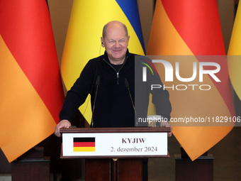 Federal Chancellor of Germany Olaf Scholz attends a joint briefing with President of Ukraine Volodymyr Zelenskyy in Kyiv, Ukraine, on Decemb...