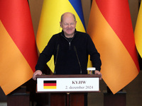 Federal Chancellor of Germany Olaf Scholz attends a joint briefing with President of Ukraine Volodymyr Zelenskyy in Kyiv, Ukraine, on Decemb...