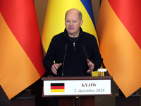 Federal Chancellor of Germany Olaf Scholz attends a joint briefing with President of Ukraine Volodymyr Zelenskyy in Kyiv, Ukraine, on Decemb...