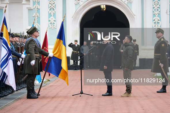 Federal Chancellor of Germany Olaf Scholz and President of Ukraine Volodymyr Zelenskyy face honor guards at Saint Sophia Cathedral in Kyiv,...