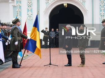 Federal Chancellor of Germany Olaf Scholz and President of Ukraine Volodymyr Zelenskyy face honor guards at Saint Sophia Cathedral in Kyiv,...