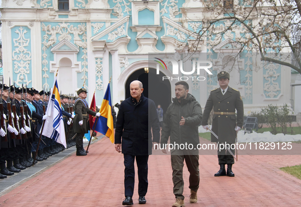 In Kyiv, Ukraine, on December 2, 2024, Federal Chancellor of Germany Olaf Scholz and President of Ukraine Volodymyr Zelenskyy (L to R) walk...