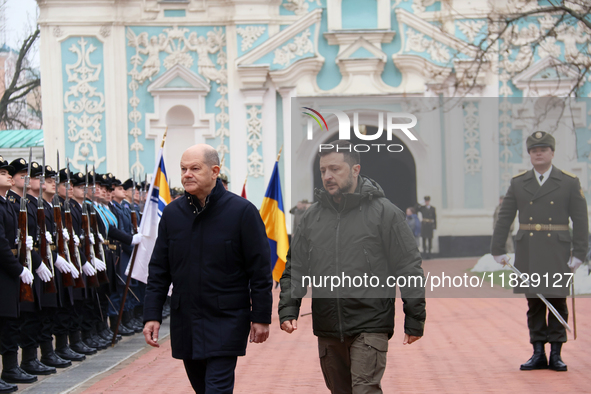 In Kyiv, Ukraine, on December 2, 2024, Federal Chancellor of Germany Olaf Scholz and President of Ukraine Volodymyr Zelenskyy (L to R) walk...