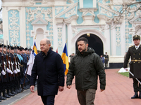 In Kyiv, Ukraine, on December 2, 2024, Federal Chancellor of Germany Olaf Scholz and President of Ukraine Volodymyr Zelenskyy (L to R) walk...