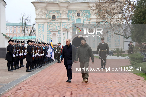 In Kyiv, Ukraine, on December 2, 2024, Federal Chancellor of Germany Olaf Scholz and President of Ukraine Volodymyr Zelenskyy (L to R) walk...