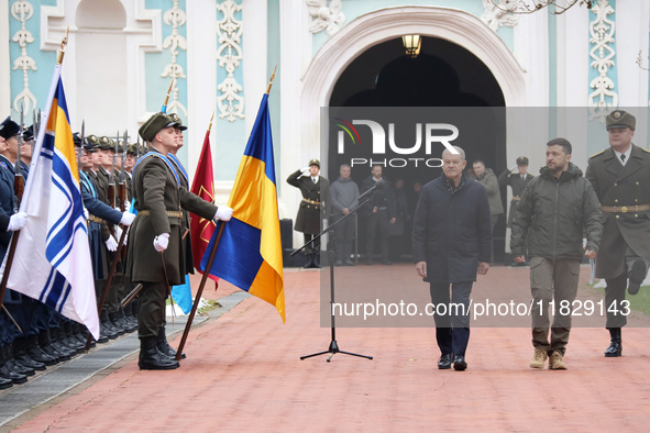 In Kyiv, Ukraine, on December 2, 2024, Federal Chancellor of Germany Olaf Scholz and President of Ukraine Volodymyr Zelenskyy (L to R) walk...