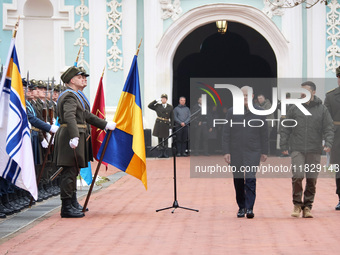 In Kyiv, Ukraine, on December 2, 2024, Federal Chancellor of Germany Olaf Scholz and President of Ukraine Volodymyr Zelenskyy (L to R) walk...