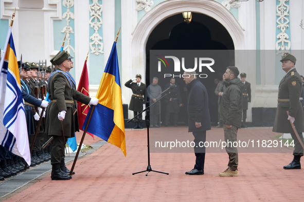 Federal Chancellor of Germany Olaf Scholz and President of Ukraine Volodymyr Zelenskyy face honor guards at Saint Sophia Cathedral in Kyiv,...