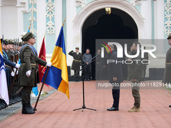 Federal Chancellor of Germany Olaf Scholz and President of Ukraine Volodymyr Zelenskyy face honor guards at Saint Sophia Cathedral in Kyiv,...