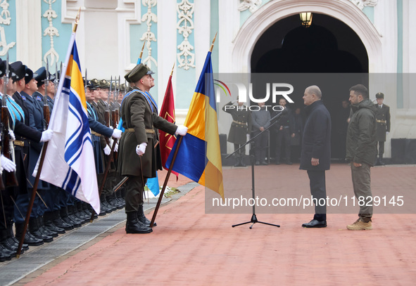 Federal Chancellor of Germany Olaf Scholz and President of Ukraine Volodymyr Zelenskyy face honor guards at Saint Sophia Cathedral in Kyiv,...