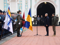 Federal Chancellor of Germany Olaf Scholz and President of Ukraine Volodymyr Zelenskyy face honor guards at Saint Sophia Cathedral in Kyiv,...