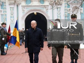 In Kyiv, Ukraine, on December 2, 2024, Federal Chancellor of Germany Olaf Scholz and President of Ukraine Volodymyr Zelenskyy (L to R) walk...