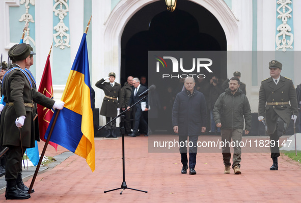 In Kyiv, Ukraine, on December 2, 2024, Federal Chancellor of Germany Olaf Scholz and President of Ukraine Volodymyr Zelenskyy (L to R) walk...