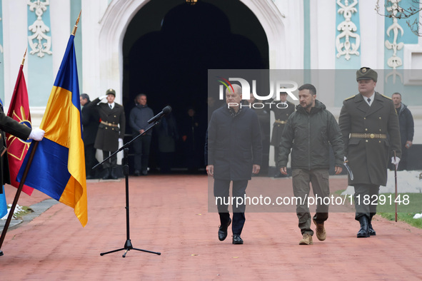 In Kyiv, Ukraine, on December 2, 2024, Federal Chancellor of Germany Olaf Scholz and President of Ukraine Volodymyr Zelenskyy (L to R) walk...