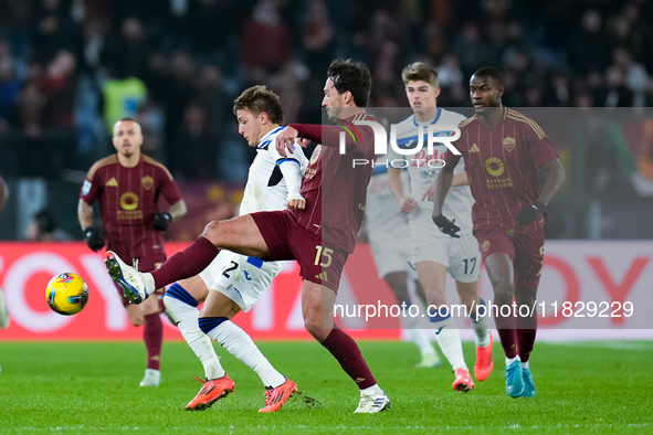 Mateo Retegui of Atalanta BC and Mats Hummels of AS Roma compete for the ball during the Serie A Enilive match between AS Roma and Atalanta...